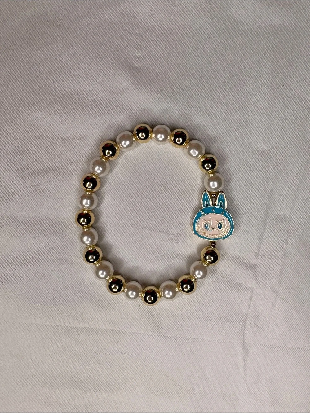 Kids Gold & Pearl Beaded Bracelet with Blue Character Charm